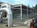 Air supply and exhaust system for enclosed composting