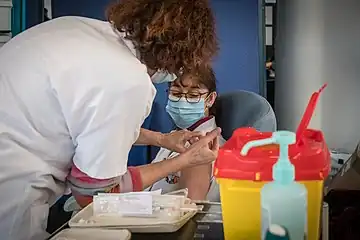 Vaccination of a health worker at the Strasbourg University Hospital on 8 January 2021.