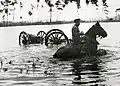 A Dutch 8 cm A. Br. during a trial in the inundated area in September 1939.