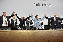 Image 14The Paris Agreement (formerly the Kyoto Protocol) is adopted in 2016. Nearly every country in the United Nations has signed the treaty, which aims to reduce greenhouse gas emissions. (from Environmental science)