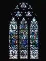 The 'Womanhood' window by Douglas Strachan in the NW nave