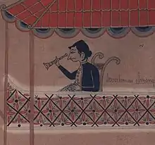 A man in Javanese traditional costume depicted sitting and looking through a monocular