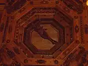 The statue of Apollo on the ceiling