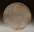 Lid from Bronze Age (2nd millennium B.C., Vojlovica excavation)