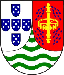 São Tomé and Príncipe(1935–1975)Red with a golden wheel and axis of a water mill and drops of water.