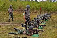 Image 24Congolese soldiers being trained by UN personnel. (from Democratic Republic of the Congo)