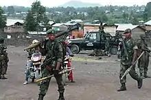 Image 18Government troops near Goma during the M23 rebellion in May 2013 (from Democratic Republic of the Congo)
