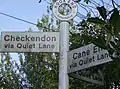 Perplexing signpost at Hookend