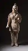Tang warrior wearing cord and plaque armour