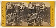 A sterioscopic photograph of the Porte Saint-Martin in Paris by Hippolyte Jouvin.