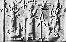Late Assyrian seal from the 8th century BCE showing a worshipper between Nabu and Marduk, standing on their servant dragon Mušḫuššu.