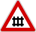 Level crossing with barrier or gate ahead(formerly used )
