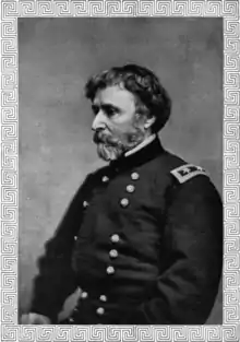 A head and torso photograph of a United States general during the American Civil War. He is looking to the right, almost in profile. He has fairly short, dark hair and a short beard that is mostly grey.