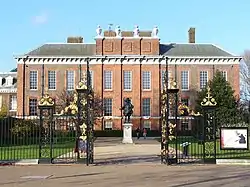 View through the Golden Gates, with the statue before the south façade of Kensington Palace
