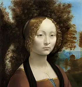 Portrait of a young woman with curly hair