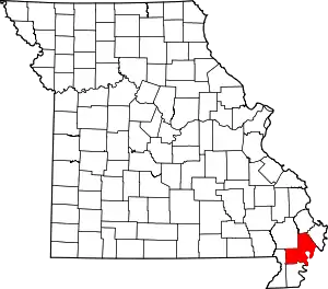A state map highlighting New Madrid County in the southeastern part of the state.