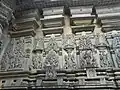 Decorative panel comprising miniature towers (aedicule)