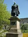 Statue to Canon Major Thomas Lester, by George Frampton(1907; Grade II)