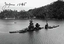 Bombed out wreck of Hyuga sunk in shallow waters of Hiroshima Bay, 1945