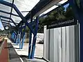 Pontevedra station running in board, clock and platform display
