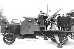 V.V. Tarnovsky (leftmost) at the Guards headquarters with the developers of the first special 76 mm anti-aircraft gun, March 1915.