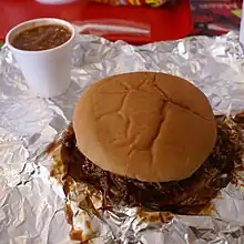 Image 47BBQ beef sandwich and smoked beans (from Culture of Arkansas)