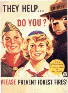Image 6Smokey Bear with members of the Boy Scouts of America and the Camp Fire Girls celebrating the 50th anniversary of their founding in 1910 (from Scouting in popular culture)