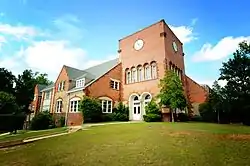 Camp Hill is home to Southern Preparatory Academy. It was formerly known as "Lyman Ward Military Academy". Tallapoosa Hall (pictured) was completed in 1930 with the help of Booker T. Washington and employees of Tuskegee University. It was added to the Alabama Register of Landmarks and Heritage on January 24, 2008.
