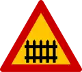 K-31Level crossing with a barrier or gate(formerly used )