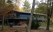Decca design, two-level rectangular house with gable roof that was similar to Goodman's design for the No. 2 two-level unit type.