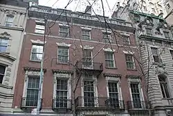 View of the front facade from the opposite sidewalk