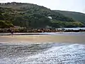The rocky western end of the beach