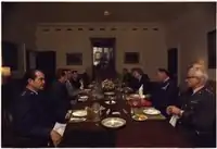 Chairman of the Joint Chiefs of Staff General George S. Brown and the other members of the Joint Chiefs of Staff during a meeting with President Jimmy Carter and the National Security Council in The White House on August 5, 1977.
